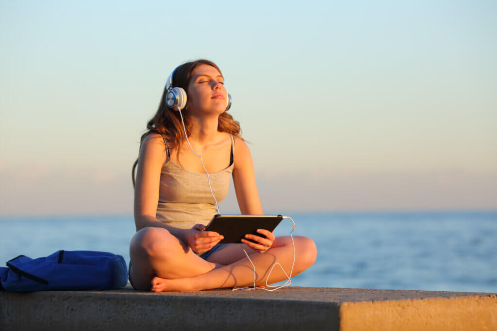 Girl discovering new ays To Live Better at Uni by meditating